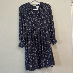 Gal Meets Glam long sleeve floral dress. Above knee, fully lined, ruche details
